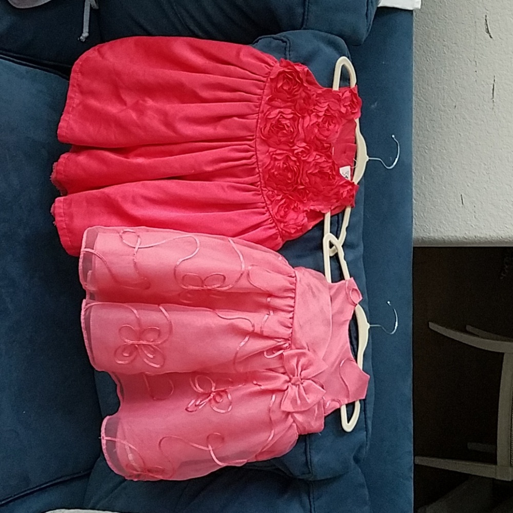 Two pink dresses